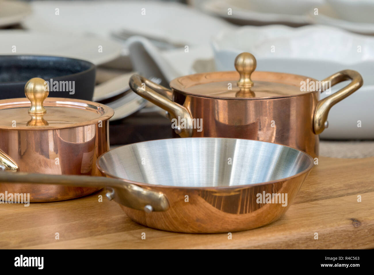 new copper cookware pots and pans Stock Photo Alamy