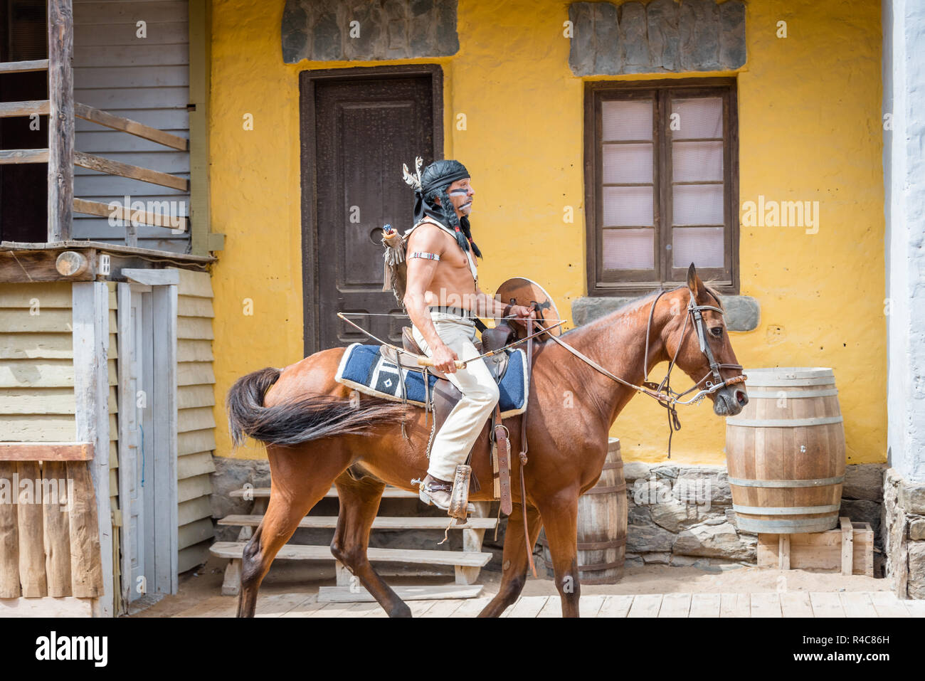 Indian man riding horse.Show entertainment at Sioux City Park San Augustin, Gran Canaria, Spain Stock Photo