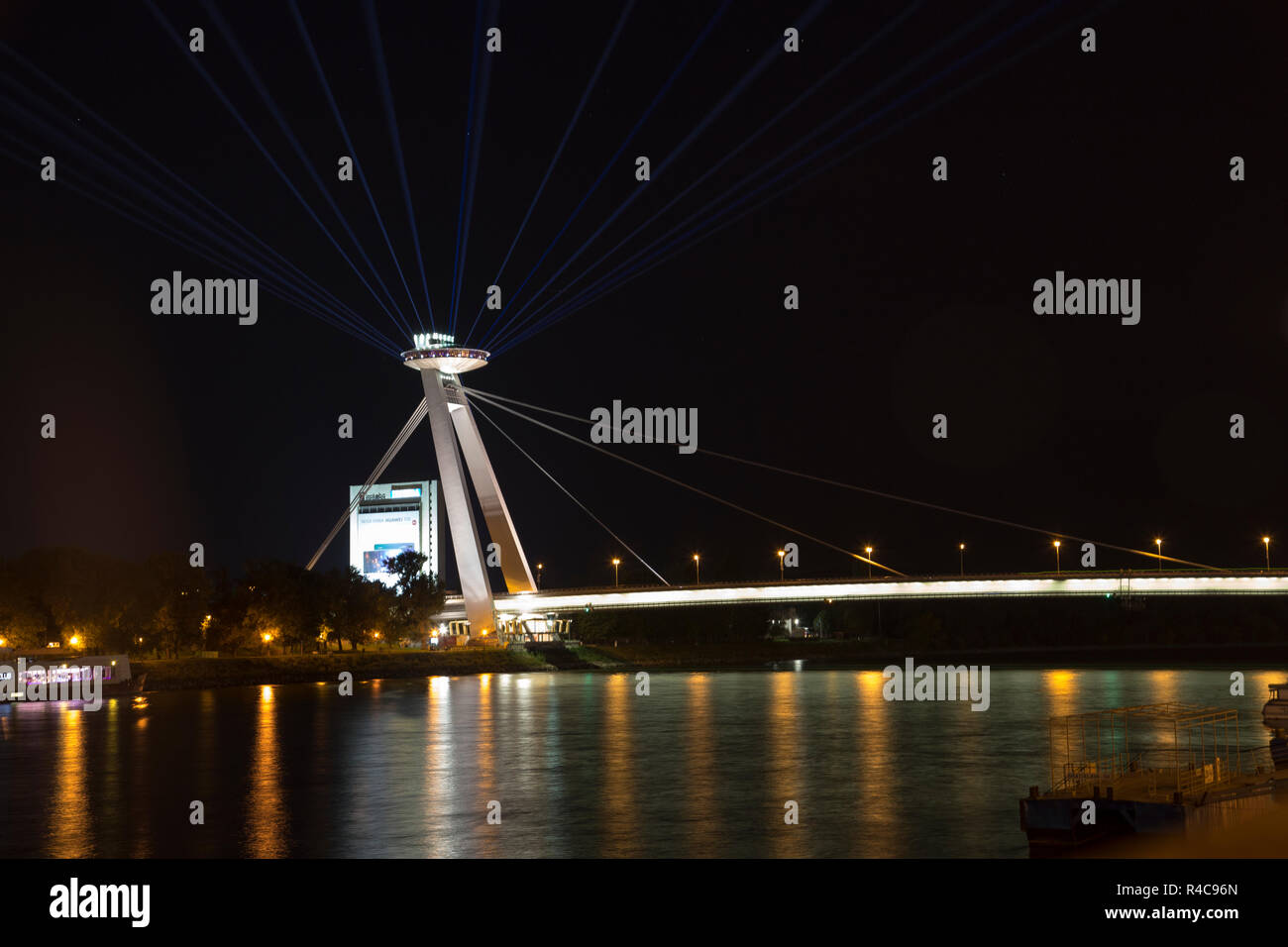 Bratislava night view of New Bridge with laser show. Stock Photo