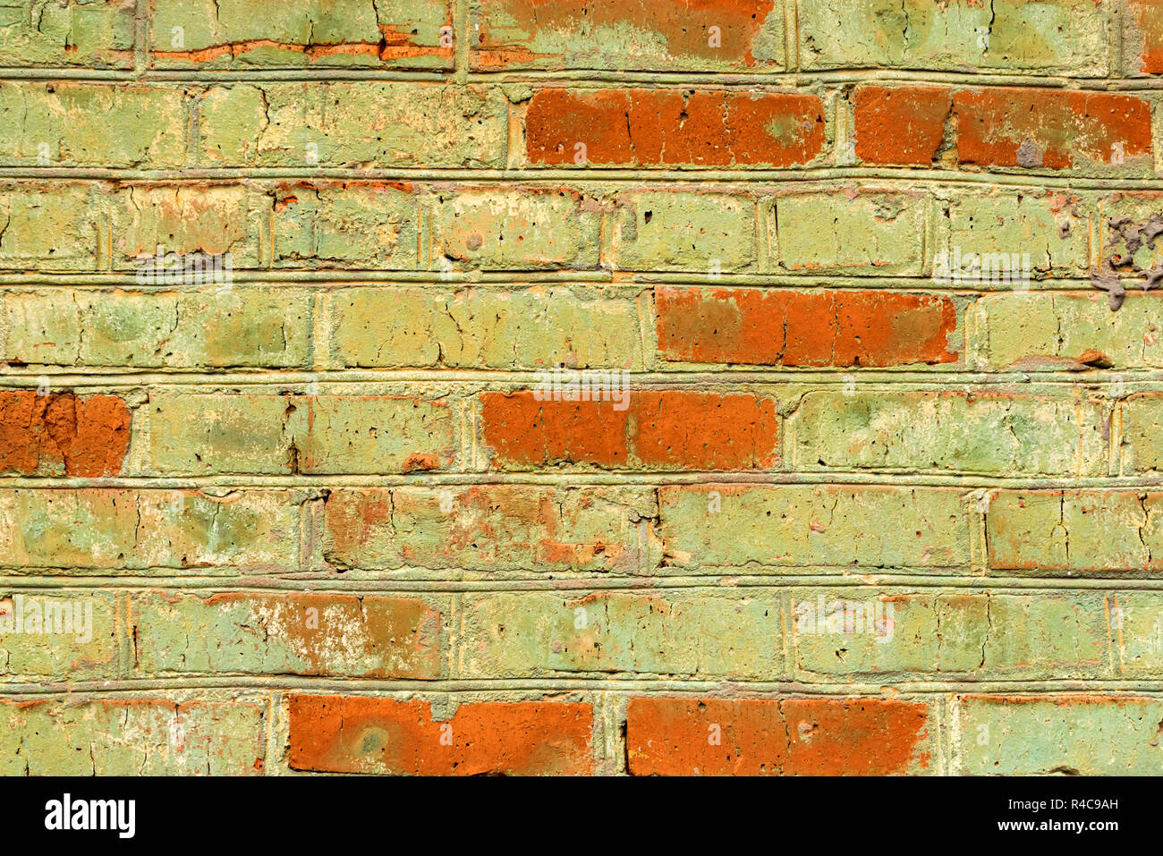 Old vintage green brick wall background close Stock Photo - Alamy