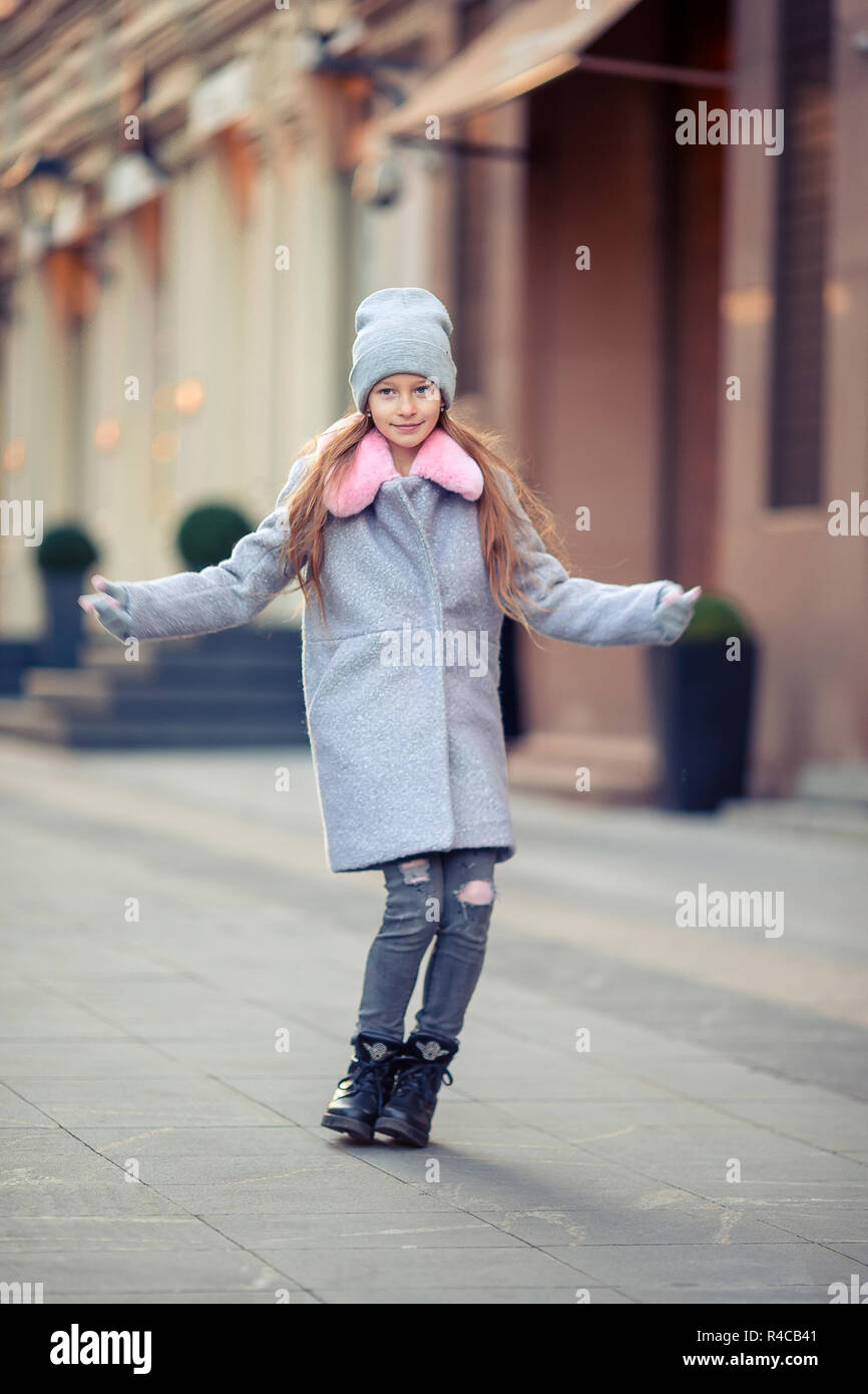 Adorable happy little girl outdoors in european city Stock Photo - Alamy
