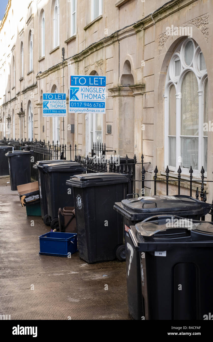 Large rubbish bins outside terrace, Clifton, Bristol Stock