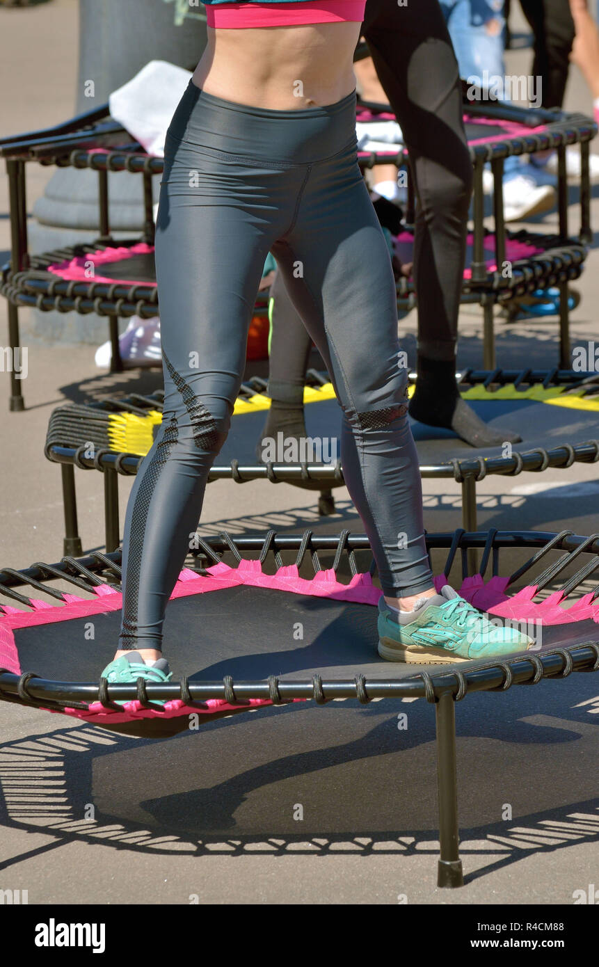 Jumping on an elastic trampoline.This exercise develops coordination