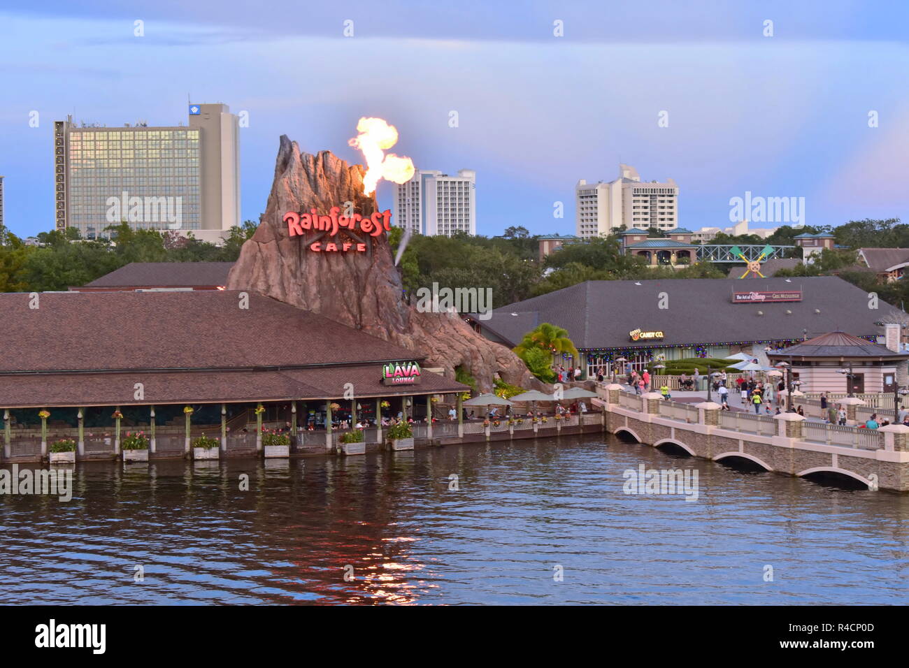 Orlando, Florida. November 18, 2018 Beautiful scenery of Volcano with flare of fire, vintage bridge, hotels and outside market . Stock Photo