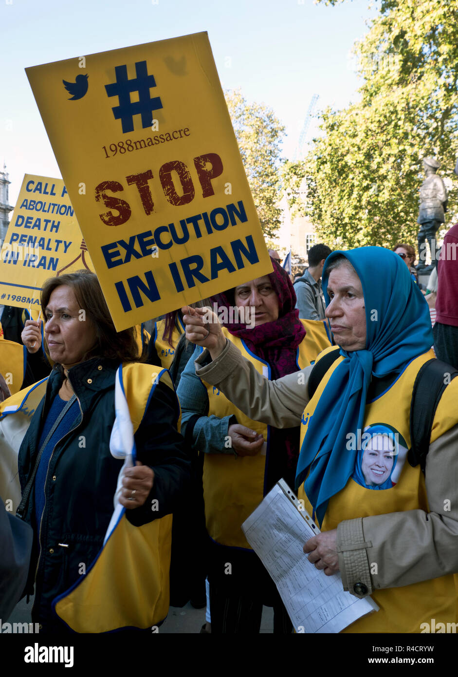 Iranian protesters protesting about executions in Iran in London outside Downing Street. Stock Photo