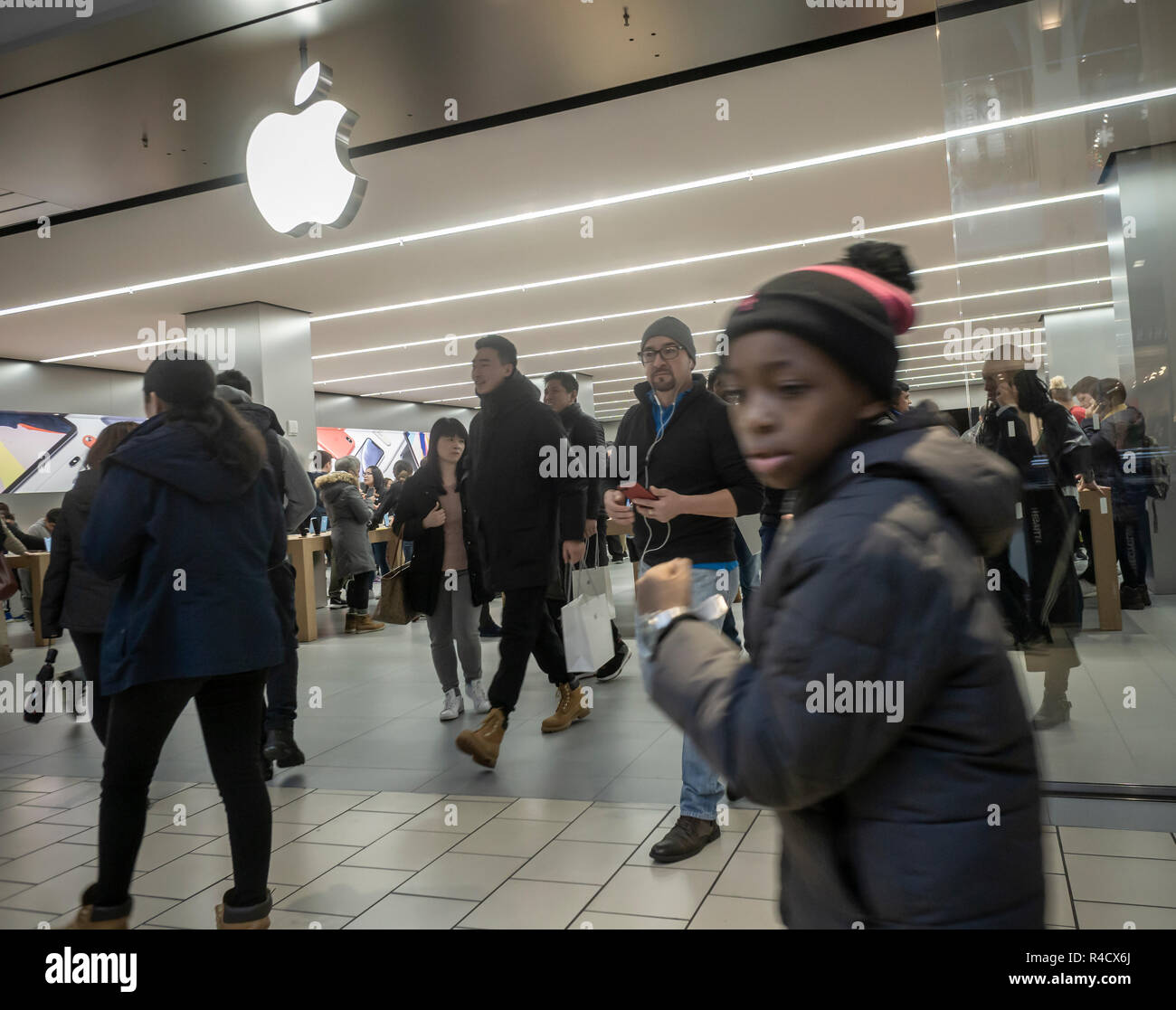 Black Friday Apple Store Shoppers outside the Apple store in the Queens Center Mall in the borough of Queens in New York over the Black Friday weekend, on Saturday, November 24, 2018. According to retail tracking