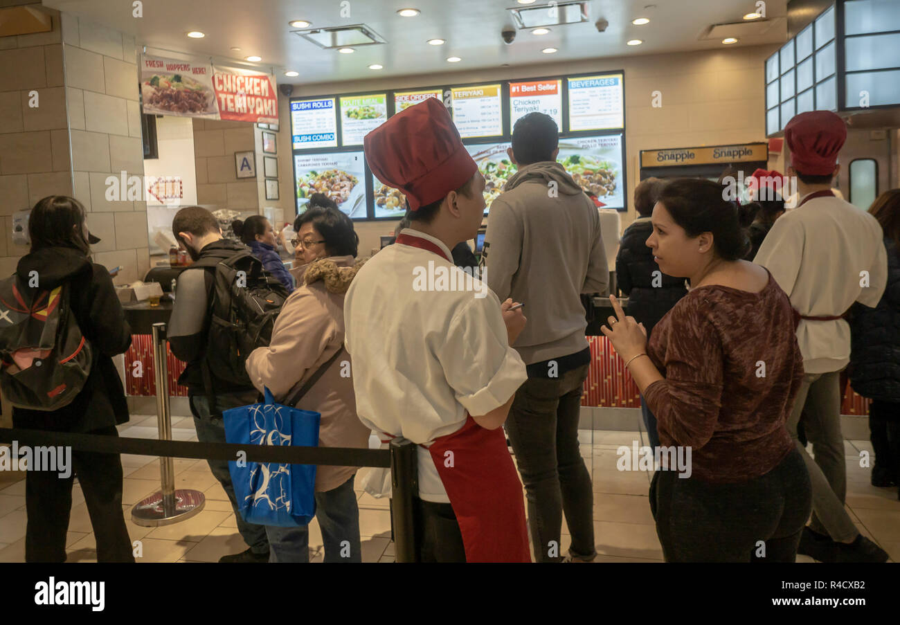 Line for chicken teriyaki in the food court at the Queens Center Mall in the borough of Queens
