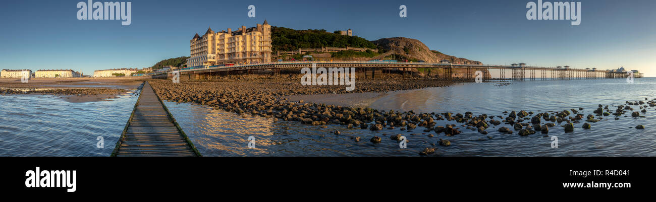 Panorama of Llandudno North Shore and pier at sunrise on the North Wales coast Stock Photo