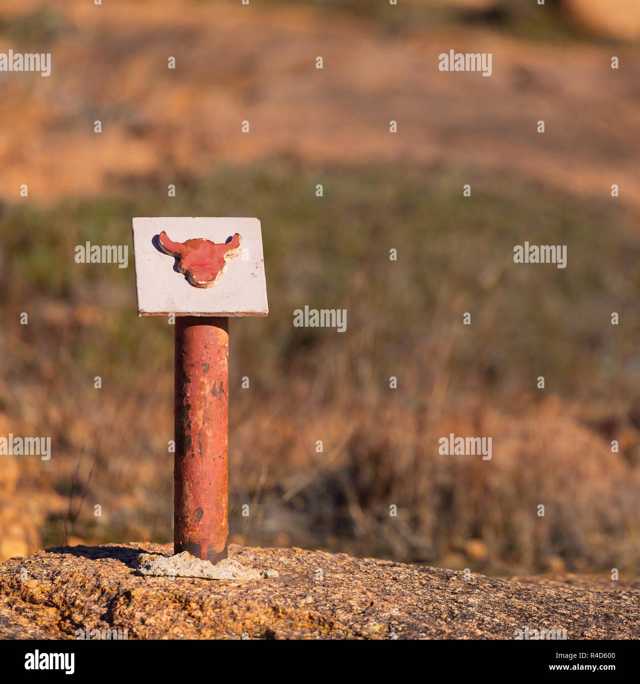 A little sign guiding your way. These signs can be found on the buffalo trail at Wichita mountains Wildlife Refuge. Stock Photo