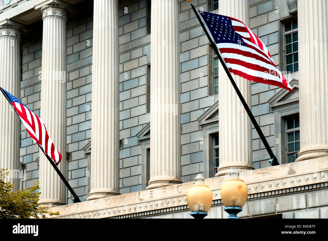 government building with the flag of the United States of America Stock