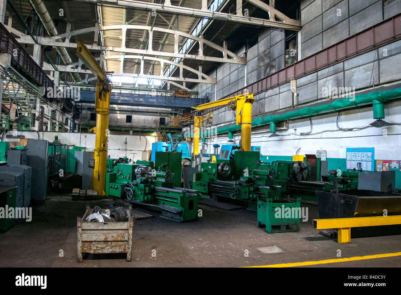 Machine shop of metallurgical works indoors room. Machining of metal by