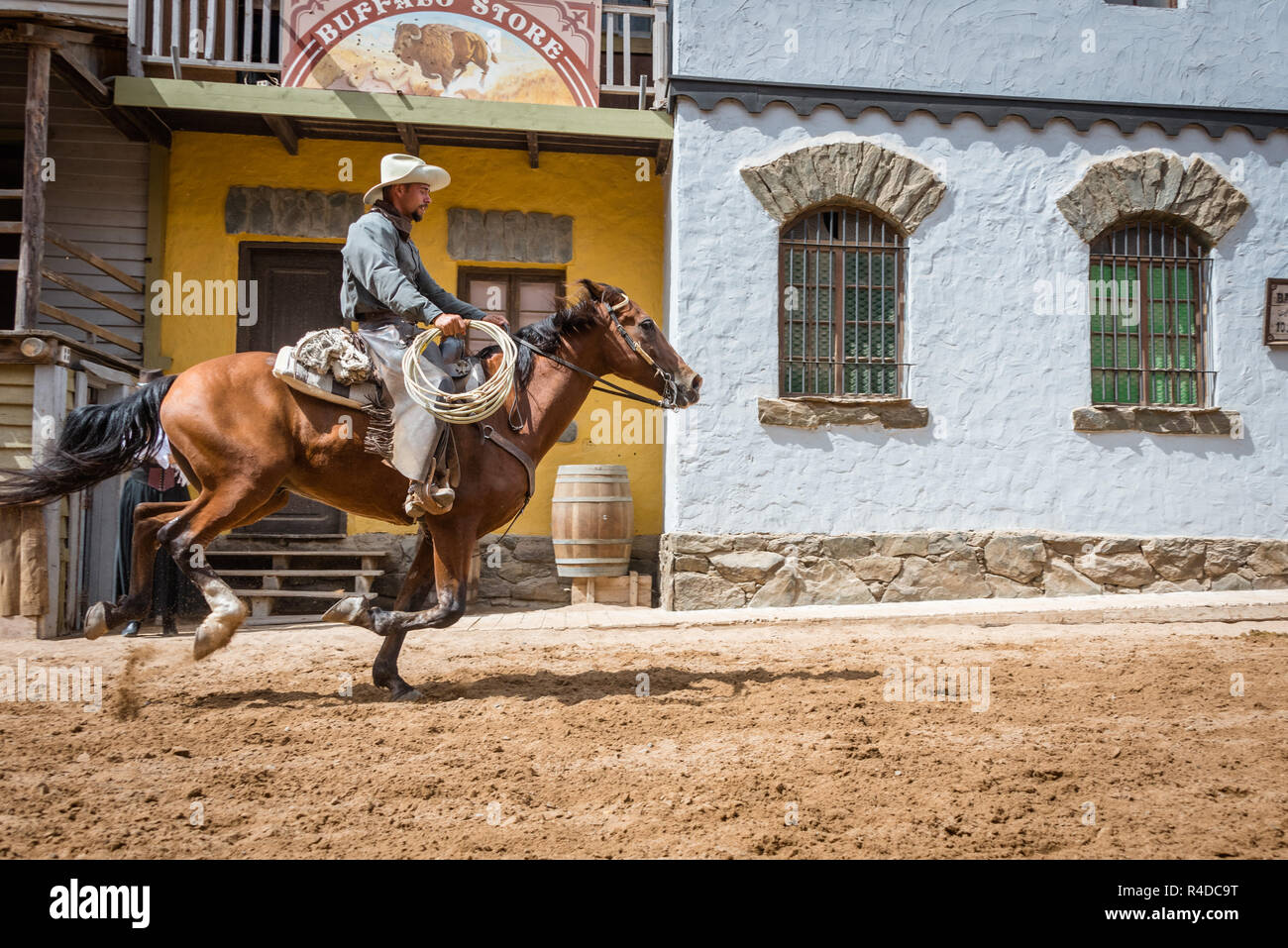 Cowboy ridding horse at Sioux City Park San Augustin, Gran Canaria, Spain Stock Photo