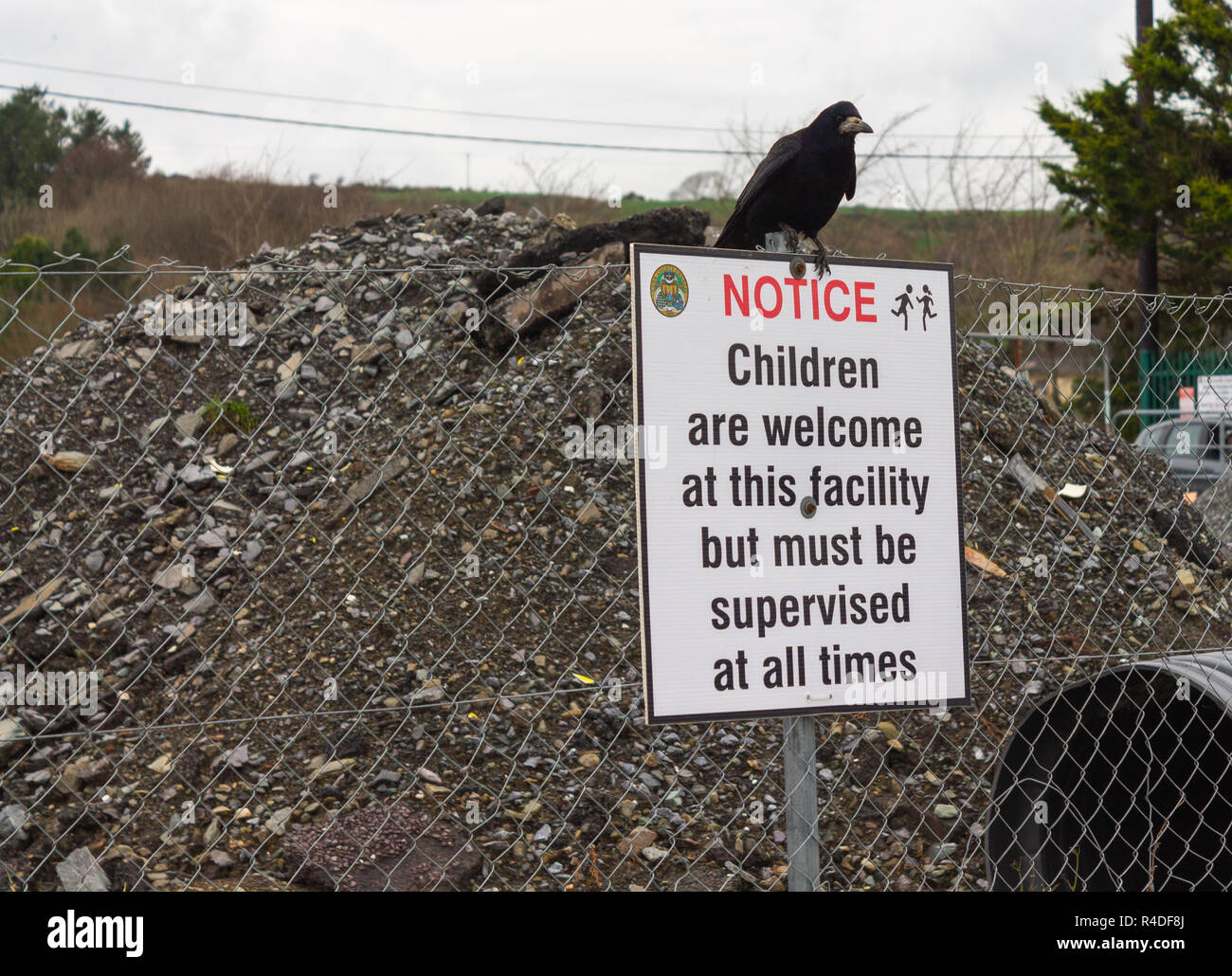 black on white sign which welcomes children onto a building site. Stock Photo