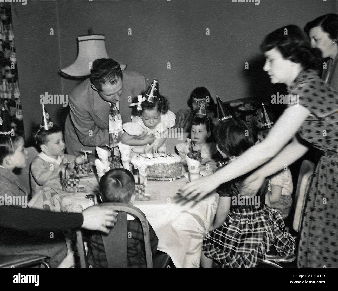 Child's birthday party circa 1950 in the USA, vintage photograph. Stock Photo