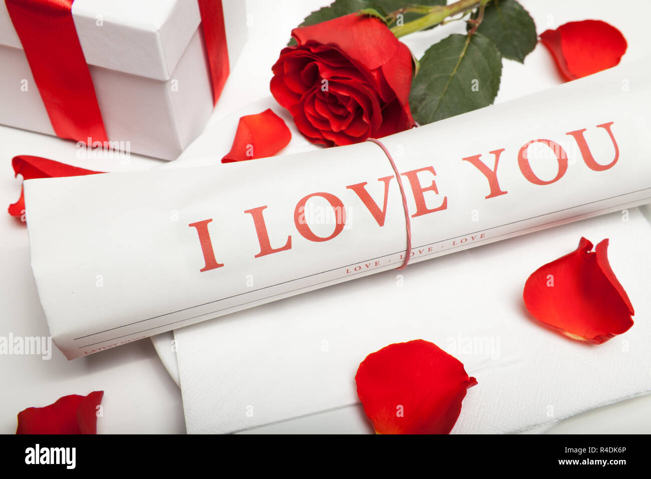 I Love You Newspaper And Red Rose Stock Photo Alamy