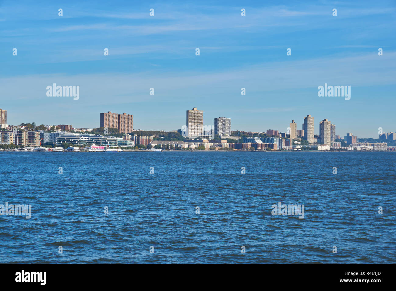 New York City skyline, a blue sky and water Stock Photo - Alamy