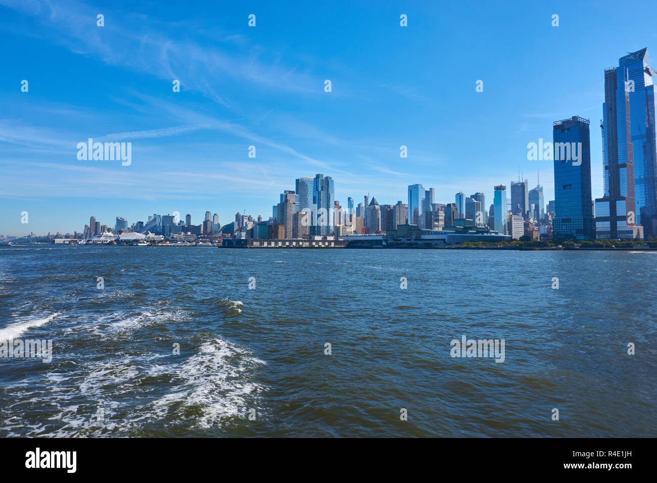 New York City skyline, a blue sky and water Stock Photo