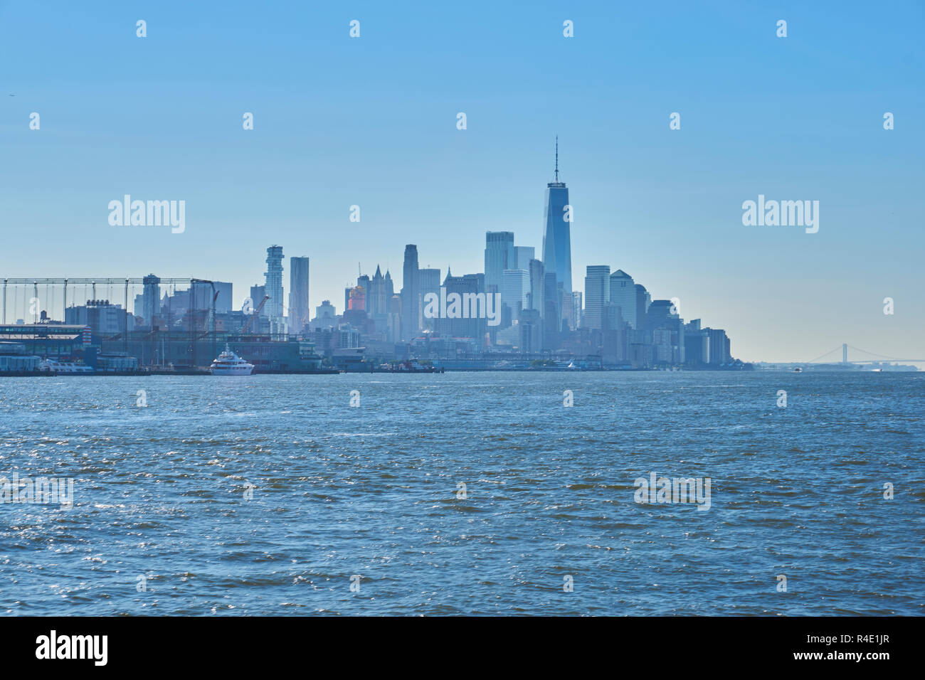 New York City skyline, a blue sky and water Stock Photo - Alamy