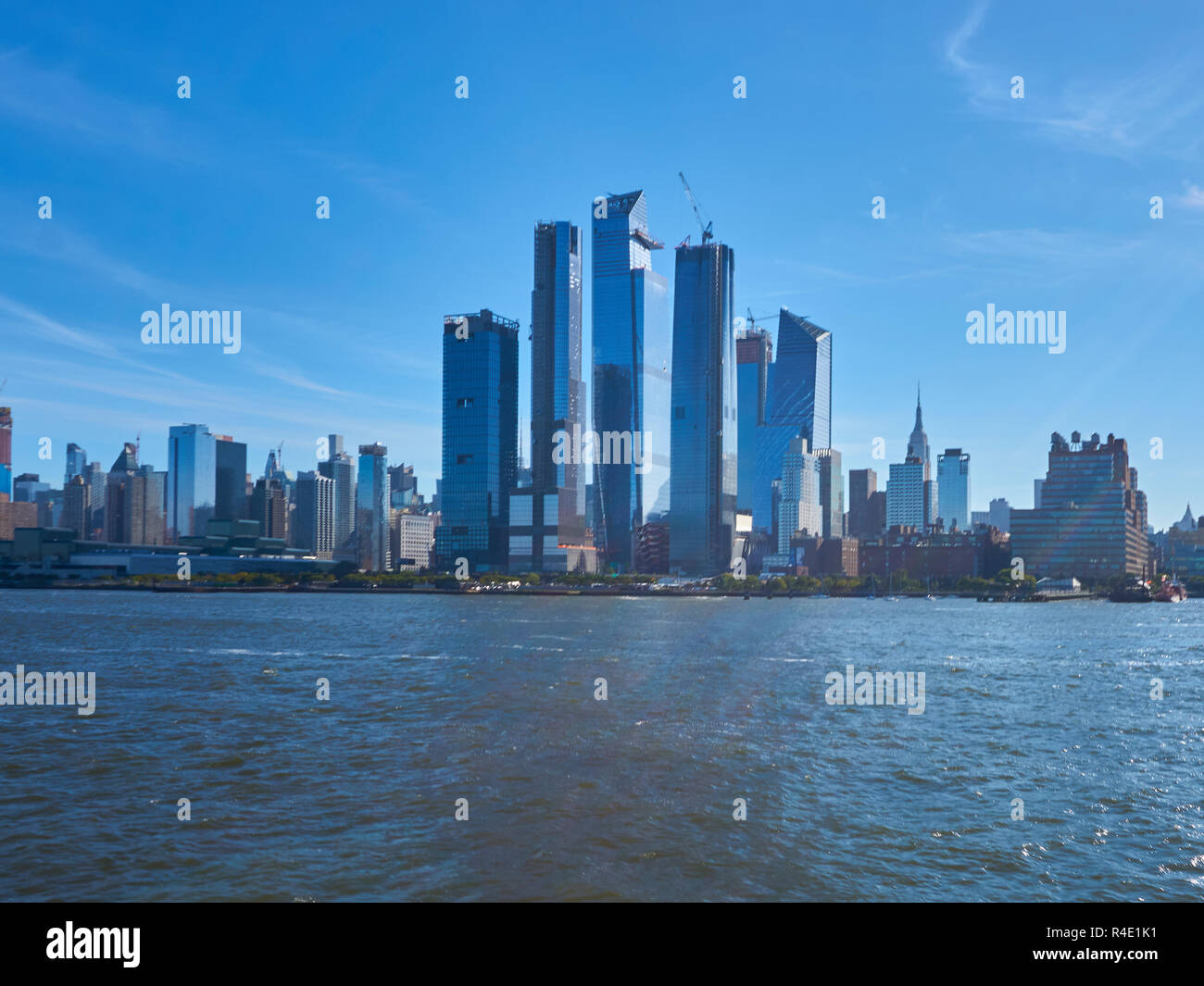 New York City skyline, a blue sky and water Stock Photo