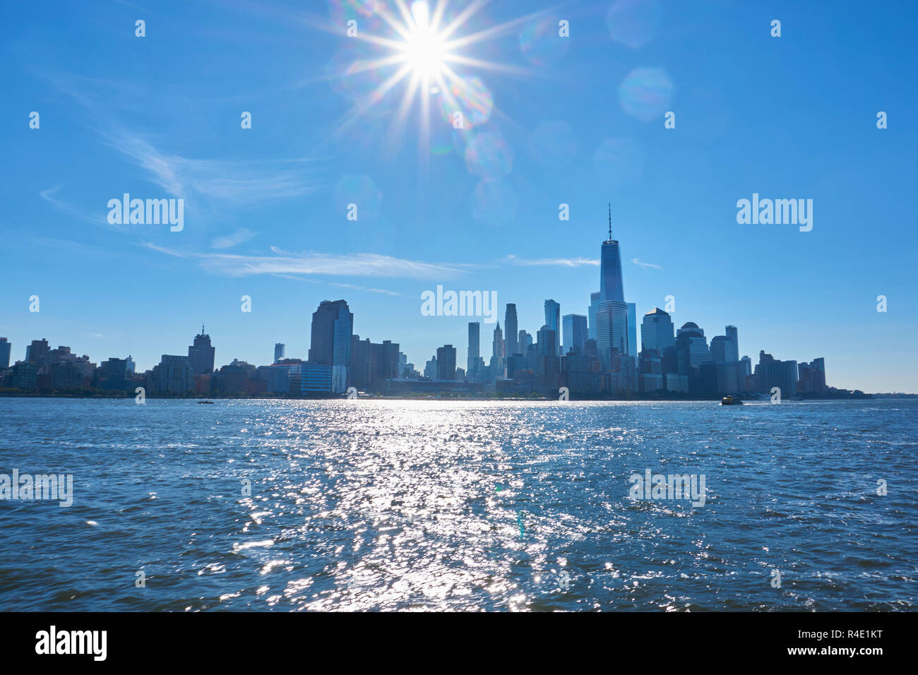 New York City skyline, a blue sky and water Stock Photo - Alamy