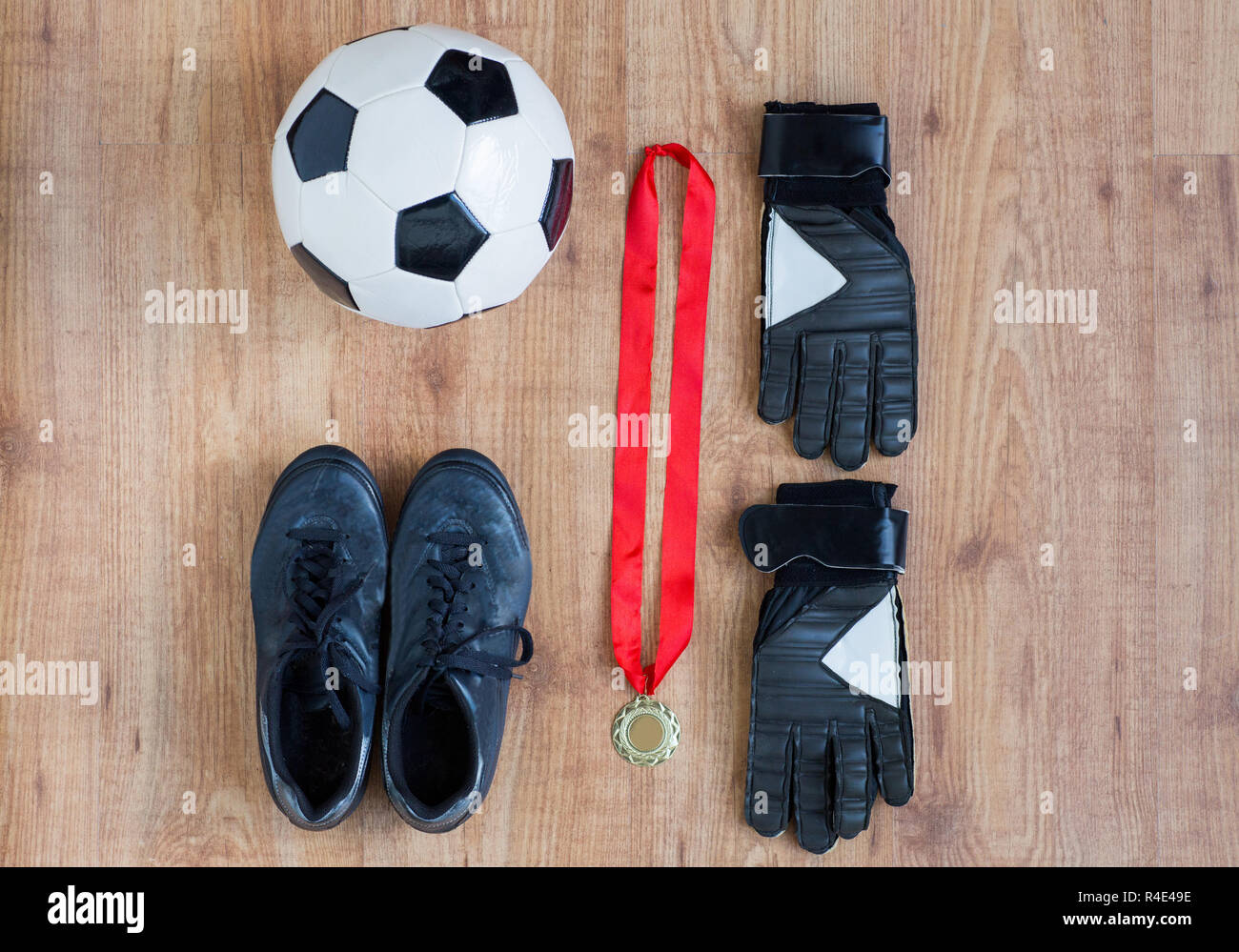 close up of soccer ball, boots, gloves and medal Stock Photo Alamy