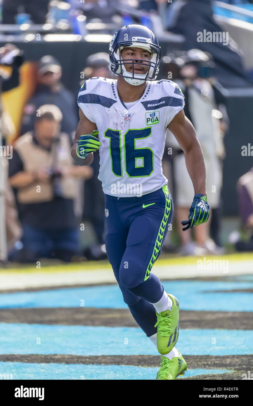 Seattle Seahawks wide receiver Tyler Lockett (16) is wrapped by Los Angeles  Rams Kickoff team during the first quarter at CenturyLink Field on October  7, 2018 in Seattle, Washington. The Rams beat