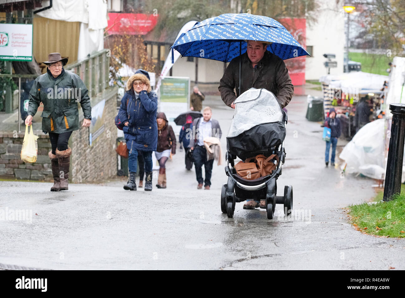 Royal Welsh Showground, Builth Wells, Powys, Wales - Tuesday 27th November 2018 - UK Weather - Visitors to the Royal Welsh Winter Fair battle rain and cold wind on the second day of the Winter Fair - Photo Steven May / Alamy Live News Stock Photo
