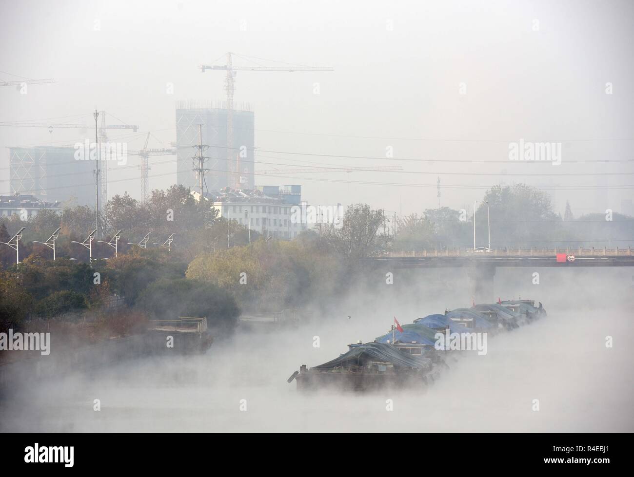 November 27, 2018 - Huai'An, Huai'an, China - HuaiÃ¢â‚¬â„¢an, CHINA-The inner canal is enveloped in mist in HuaiÃ¢â‚¬â„¢an, east ChinaÃ¢â‚¬â„¢s Jiangsu Province. Credit: SIPA Asia/ZUMA Wire/Alamy Live News Stock Photo