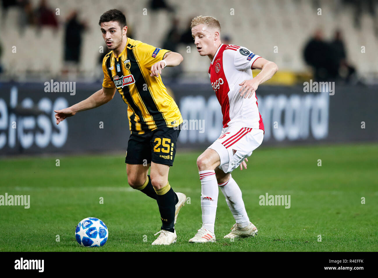 Athens, Greece. 27th November, 2018. ATHENS, Olympic Stadium, AEK Athens FC  - Ajax , football, Champions League, season 2018-2019, 27-11-2018, AEK  Athens player Kostas Galanopoulos (L) and Ajax player Donny van de