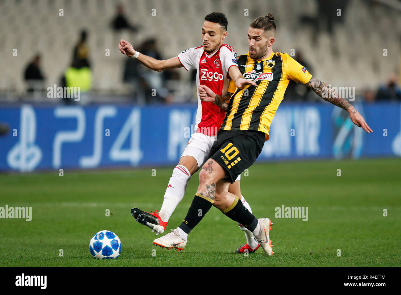 Athens, Greece. 27th November, 2018. ATHENS, Olympic Stadium, AEK Athens FC  - Ajax , football, Champions League, season 2018-2019, 27-11-2018, Ajax  player Noussair Mazraoui (L) and AEK Athens player Marko Livaja (R)