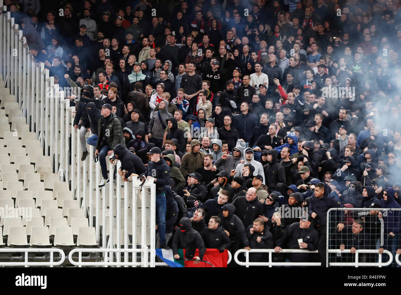 Athens, Greece. 27th November, 2018. ATHENS, Olympic Stadium, AEK Athens FC  - Ajax , football, Champions League, season 2018-2019, 27-11-2018, Ajax  supporters fighting on the stands during the game AEK Athens -