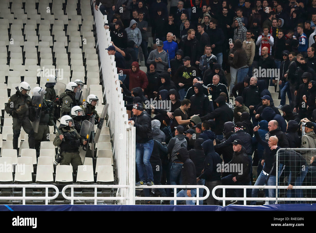 Athens, Greece. 27th November, 2018. ATHENS, Olympic Stadium, AEK Athens FC  - Ajax , football, Champions League, season 2018-2019, 27-11-2018, Ajax  fans fighting with police on the stands during the game AEK