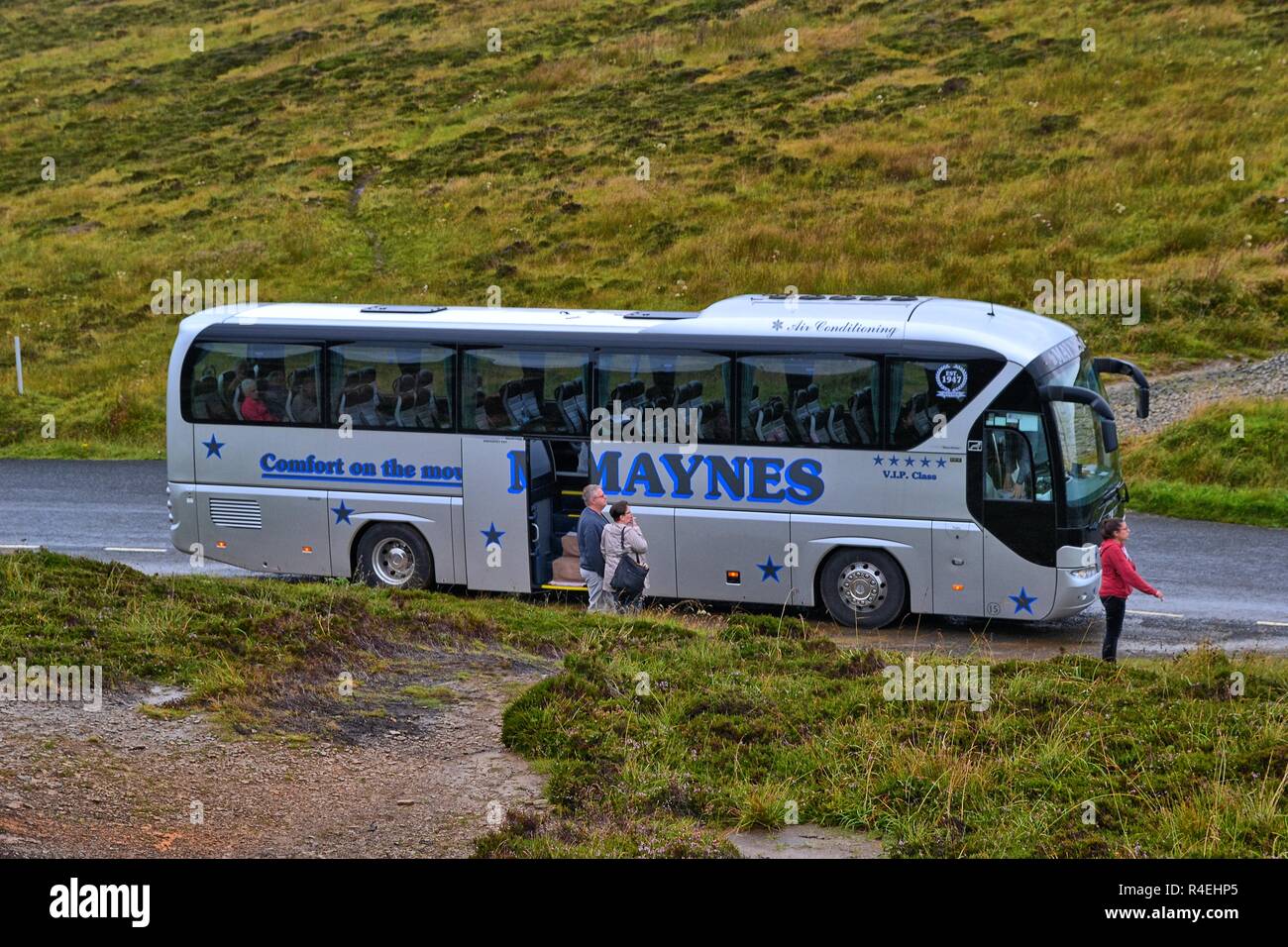 Coach party on an organised trip to the Orkney Islands Stock Photo