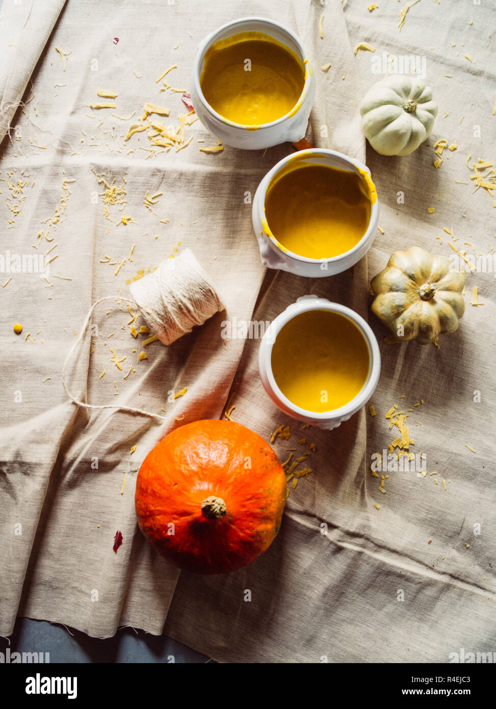 Autumnal set up, pumpkin soup inside a pumpkin, flatlay,retro filter, moody  composition, home kitchen, top view Stock Photo - Alamy