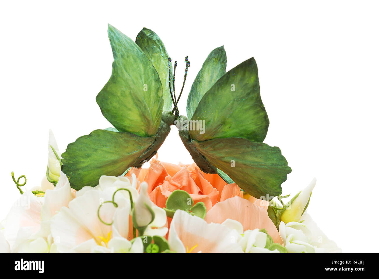 Wedding cake decorated with flowers and butterfly Stock Photo - Alamy