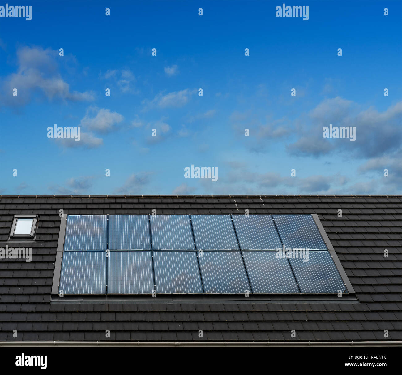 Solar Panels on roof of English Style Architecture House Stock Photo