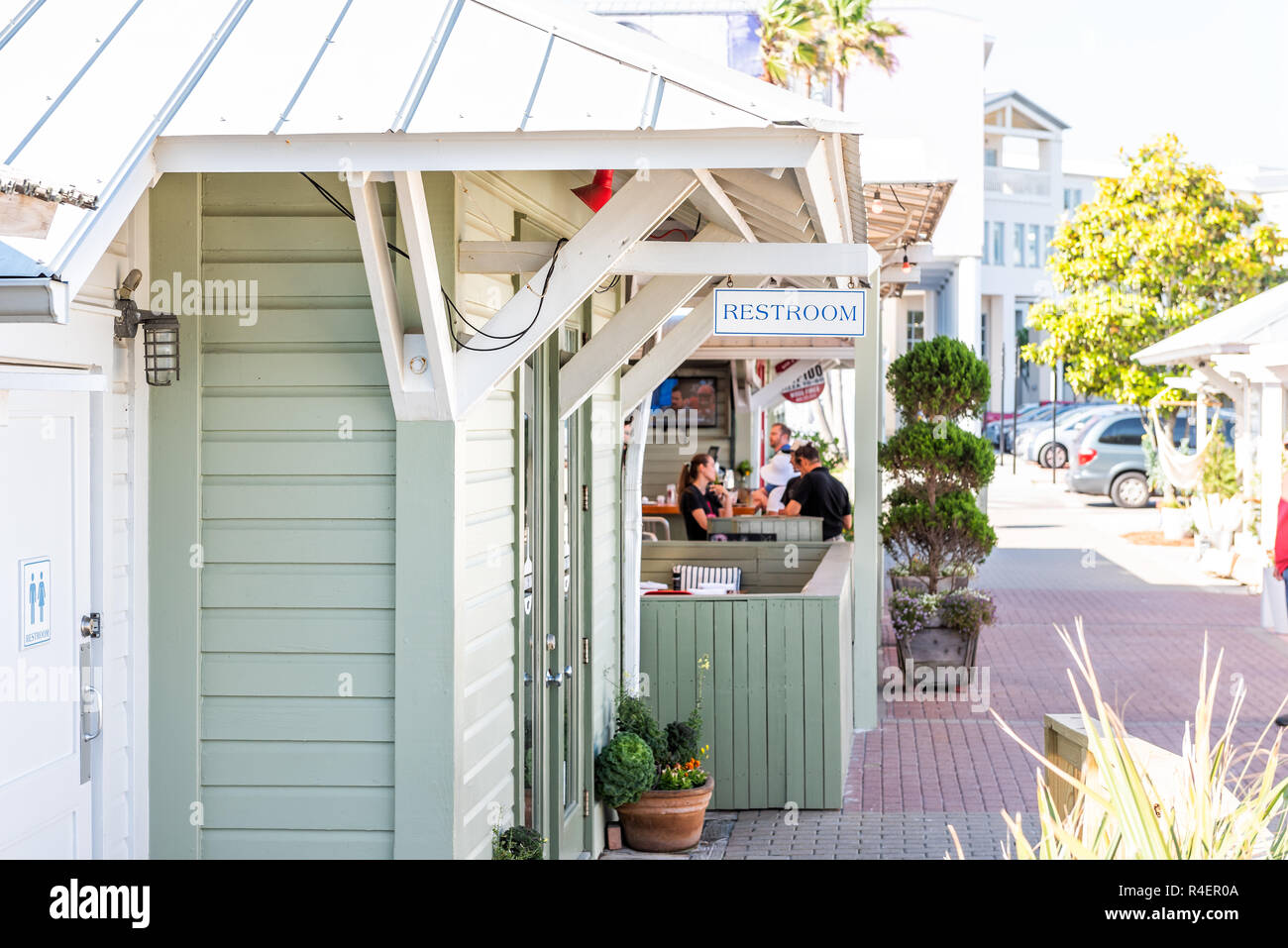 Seaside, USA - April 25, 2018: Shopping mall park square center in historic city town beach village during sunny day in Florida panhandle, white archi Stock Photo