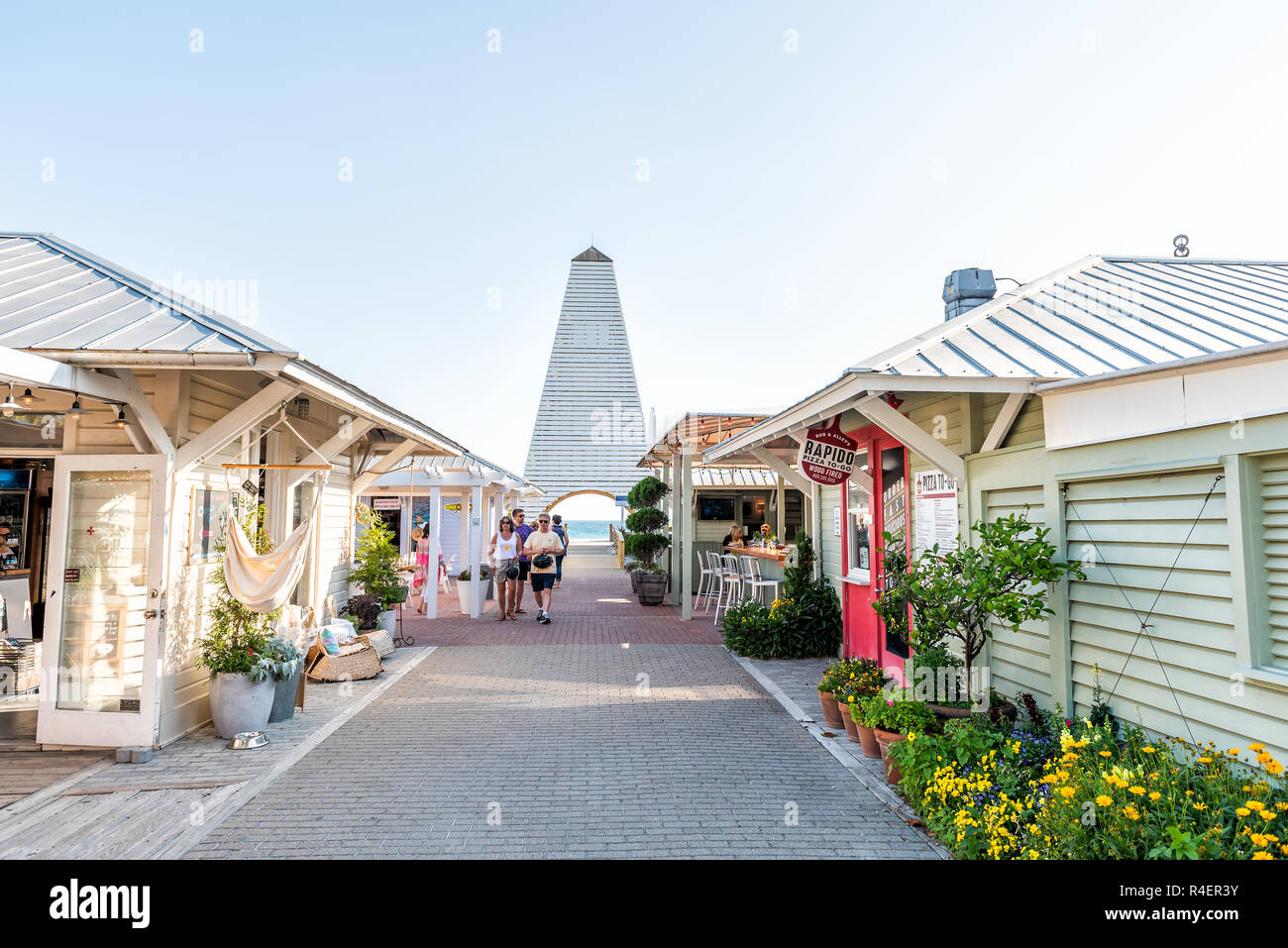 Seaside, USA - April 25, 2018: Shopping mall park square center in historic city town beach village during sunny day in Florida panhandle, white archi Stock Photo