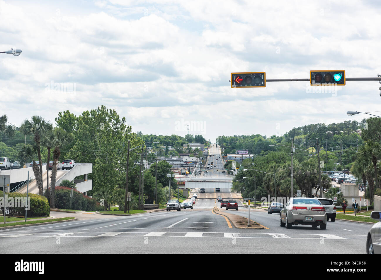 Tallahassee, USA - April 26, 2018: Capital city street road highway with cars in traffic in Florida day with light, hill Stock Photo