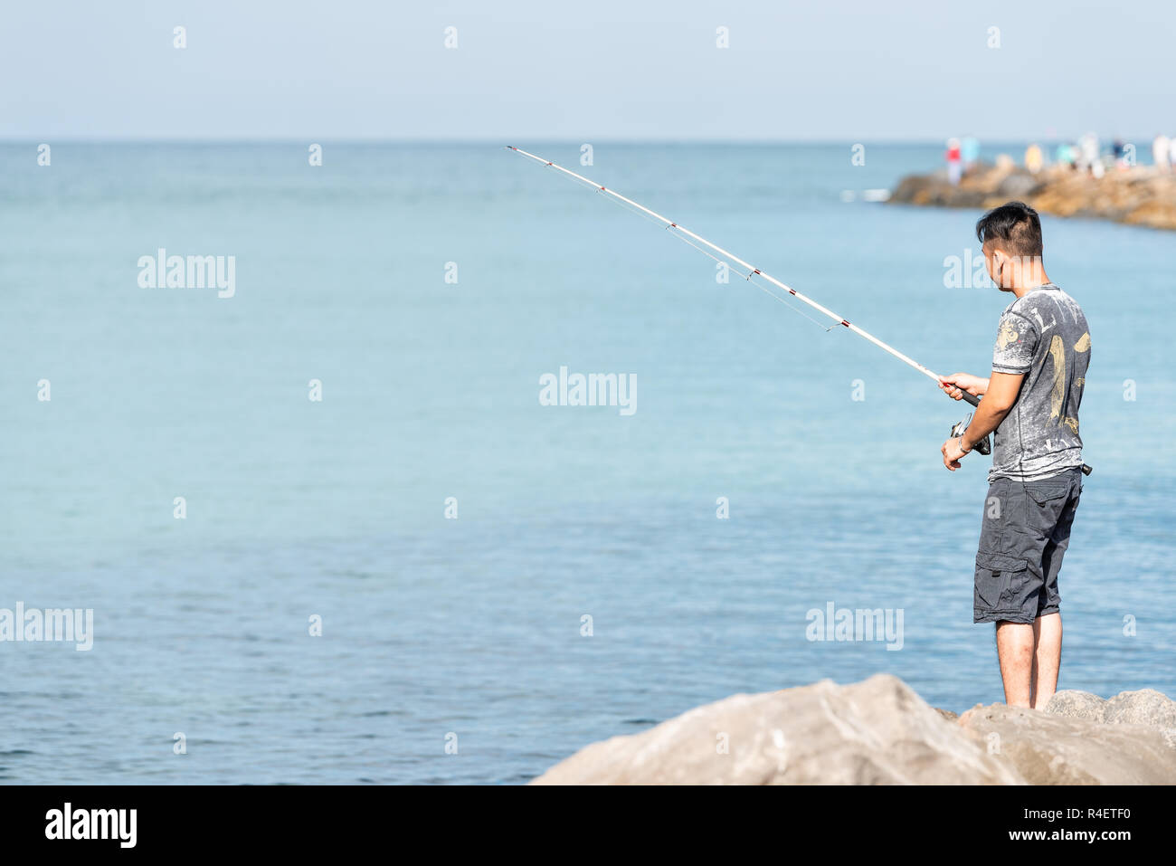 Fishing rod sea sky pier hi-res stock photography and images - Page 3 -  Alamy