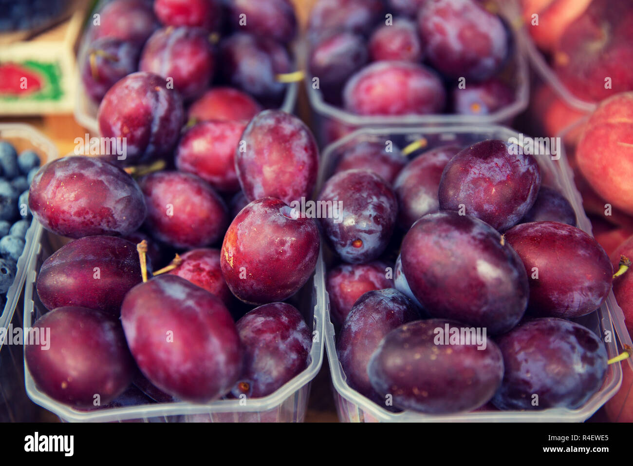 close up of satsuma plums at street market Stock Photo Alamy
