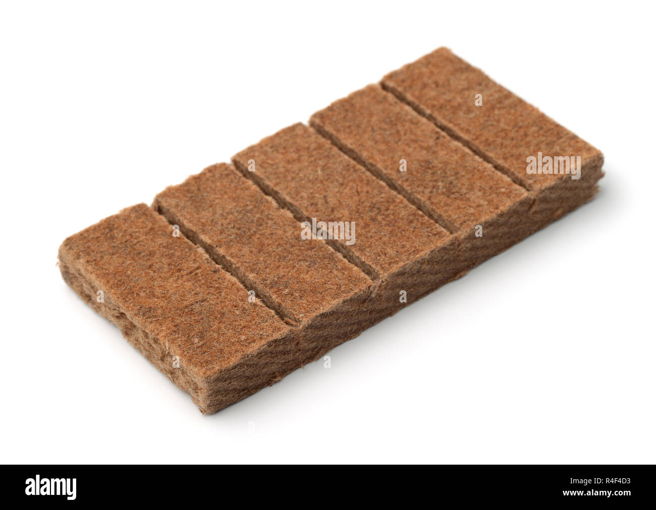 Block of kindling briquettes isolated on white Stock Photo