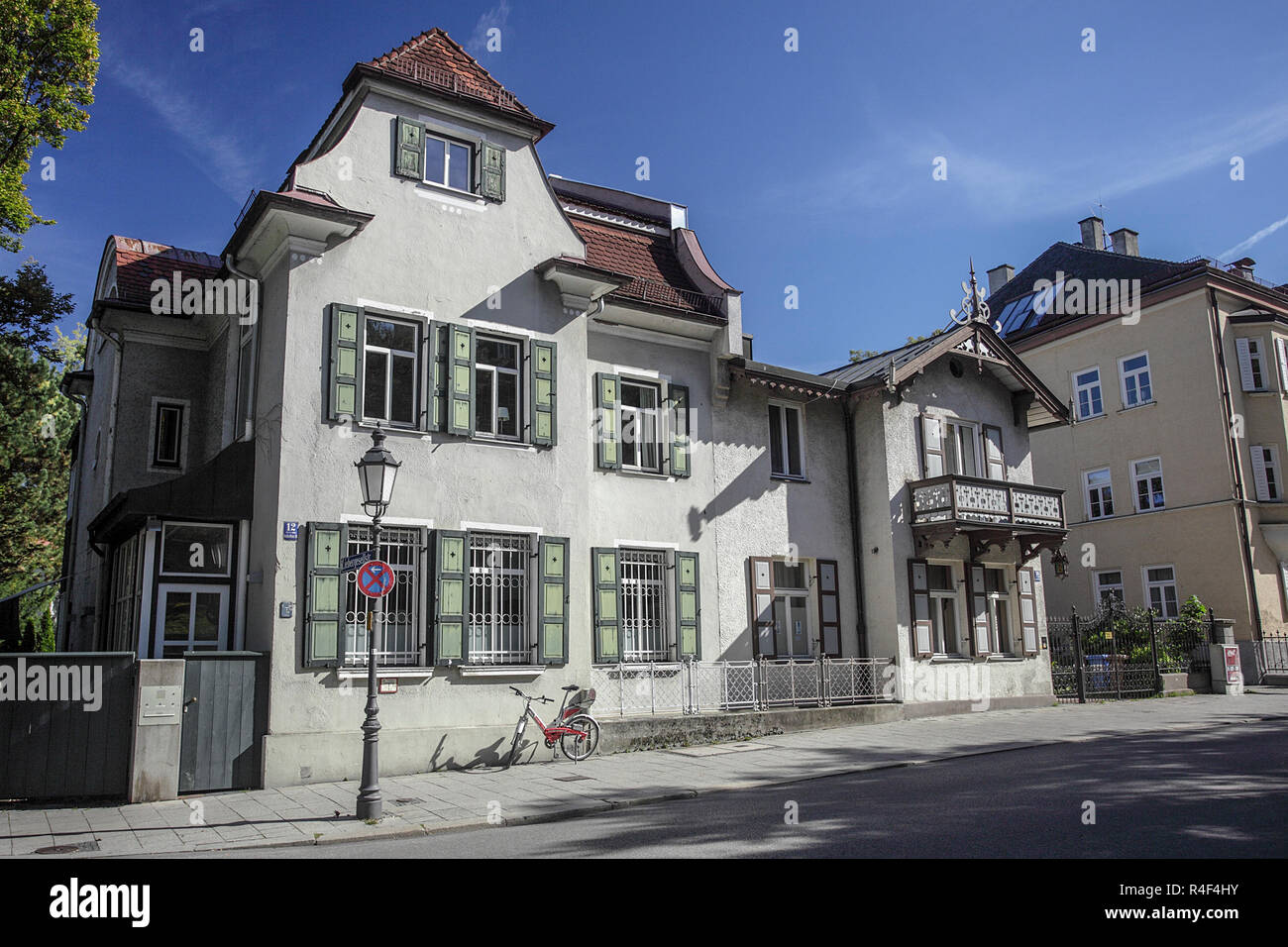 Viewed not far from the English Garden in Munich is this classic German architecture in the form of residential homes. Stock Photo