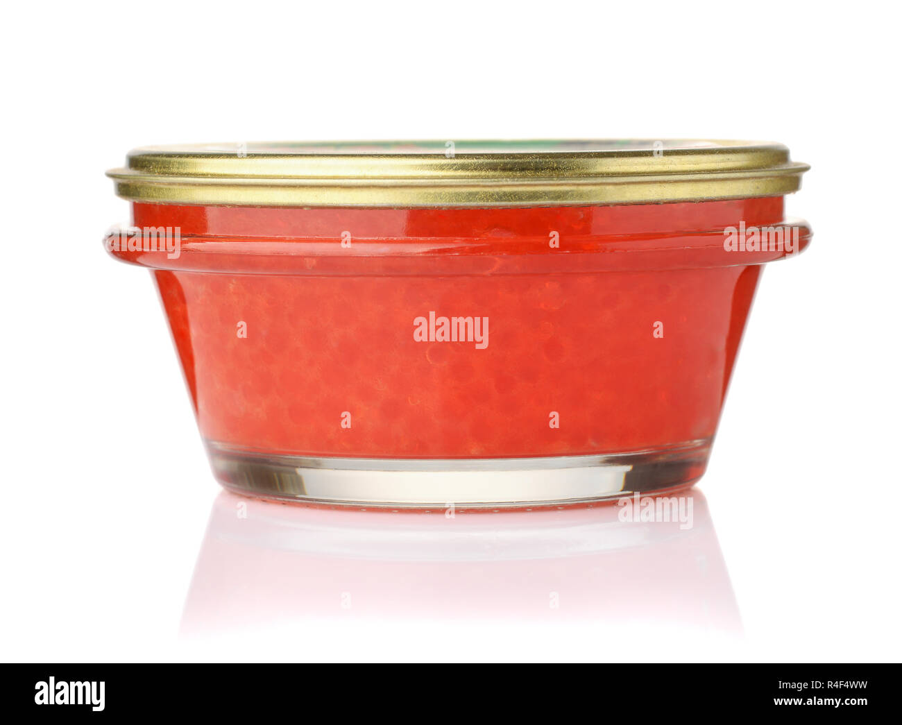 Closed glass jar of red salmon caviar  isolated on white Stock Photo