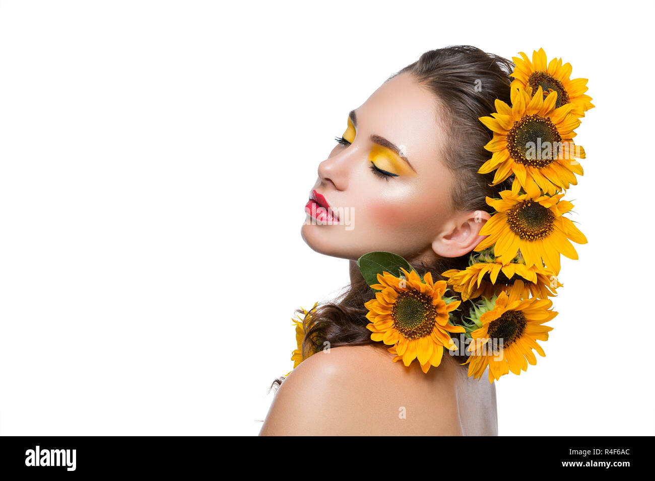 Beautiful girl with flowers in hair Stock Photo - Alamy