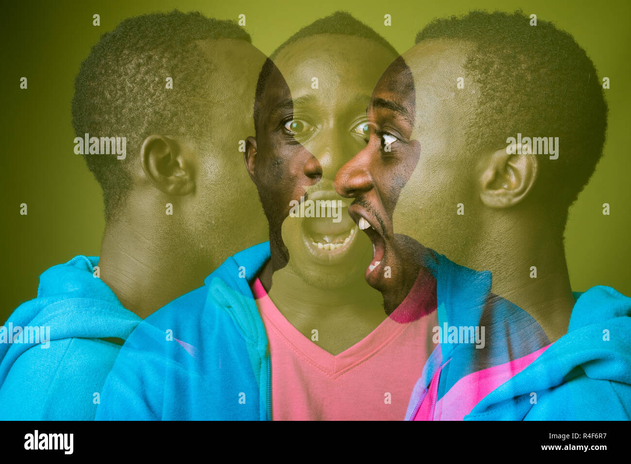Double exposure shot of young African man against green background Stock Photo