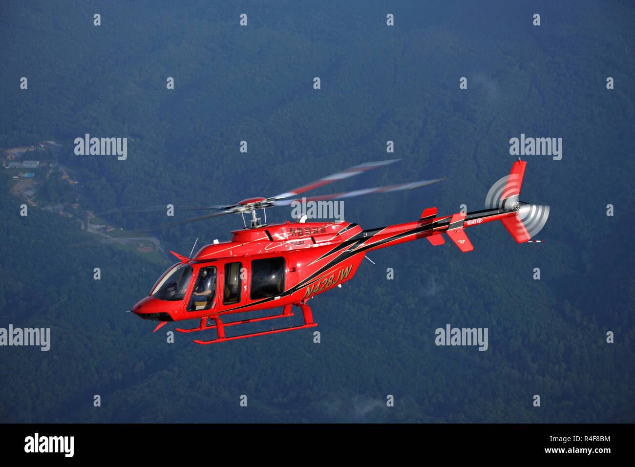 Bell 407 Civilian Helicopter Stock Photo - Alamy