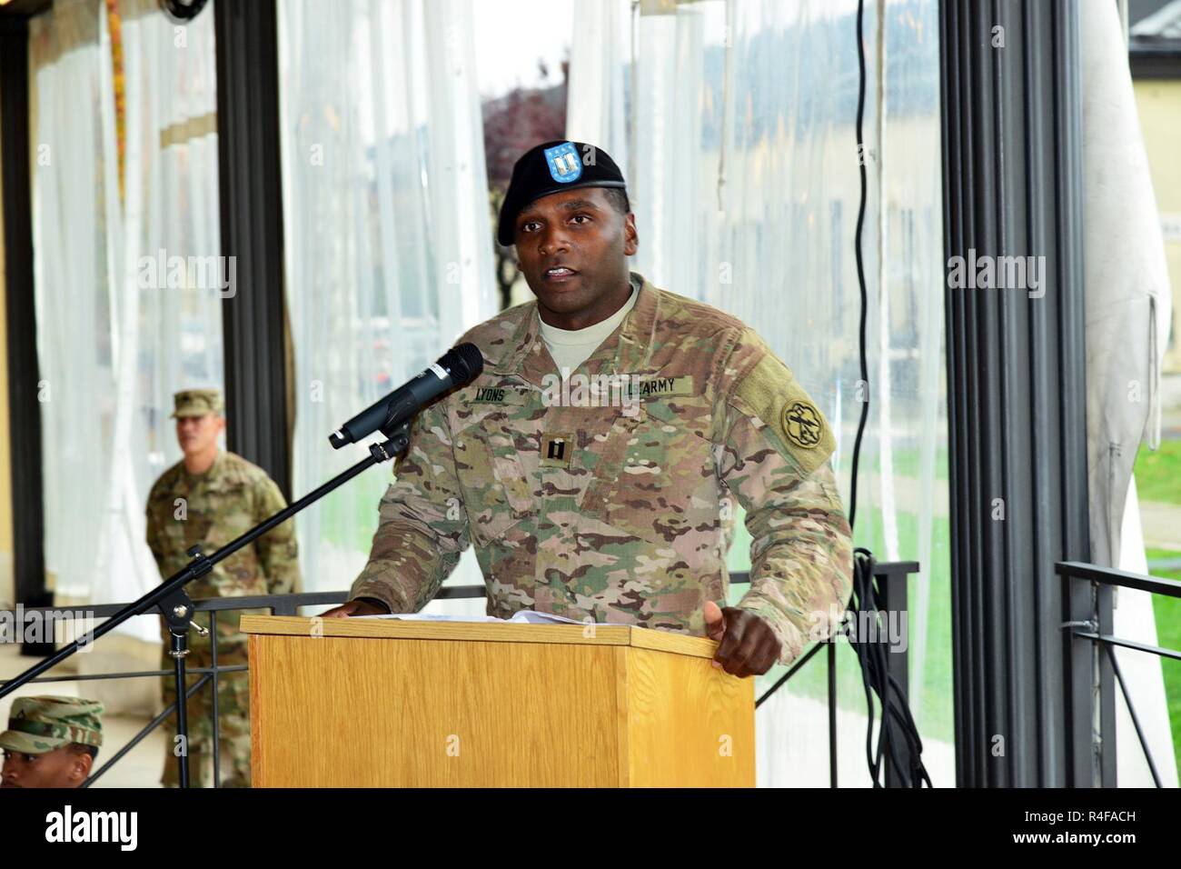 Former commander of Bravo Company, 307th Military Intelligence Battalion, Capt. Lawrence P. Lyons, gives a farewell speech, Oct 24, 2016 during the change of command ceremony at Caserma Ederle in Vicenza, Italy. Stock Photo