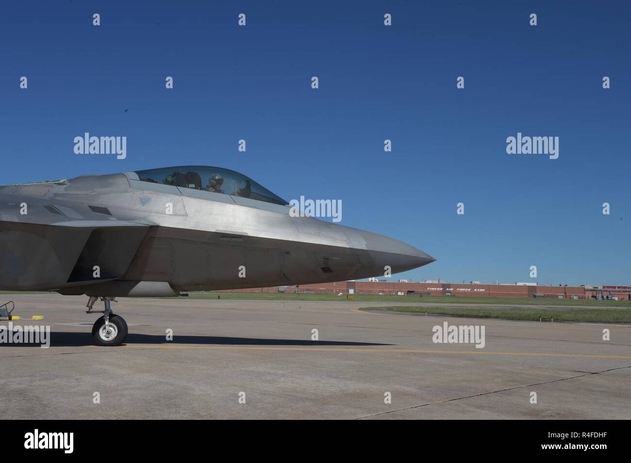 F-22A Raptor of the 325th Fighter Wing, Tyndall Air Force Base, Florida, on the transient ramp May 1, 2017, Tinker AFB, Oklahoma, during a fuel stop. Tinker AFB overhauls the Pratt & Whitney F119 engines used by the U.S Air Force's F-22 Raptor fleet. Stock Photo