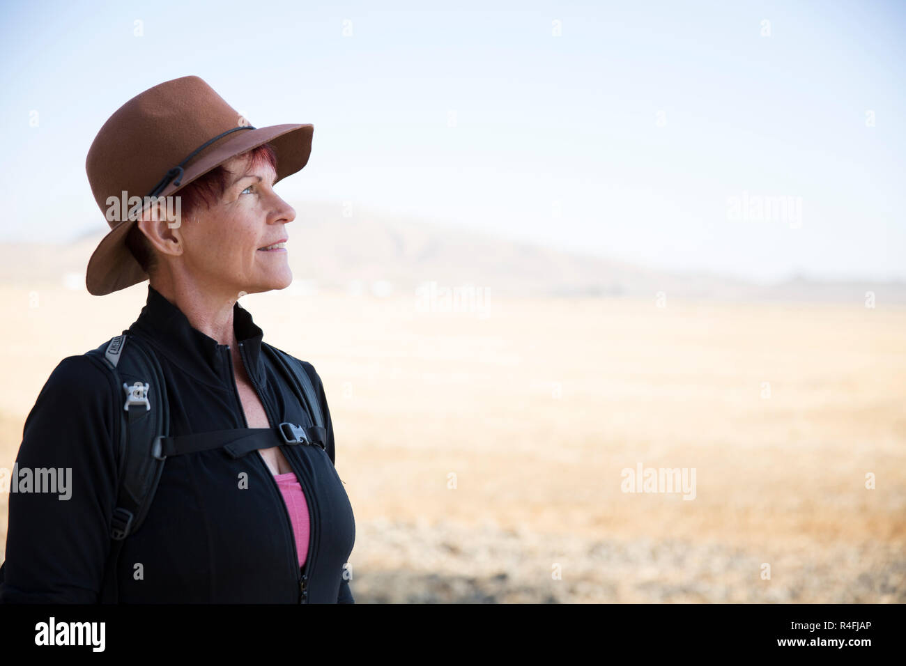 Determined Senior Woman with Hat Stock Photo